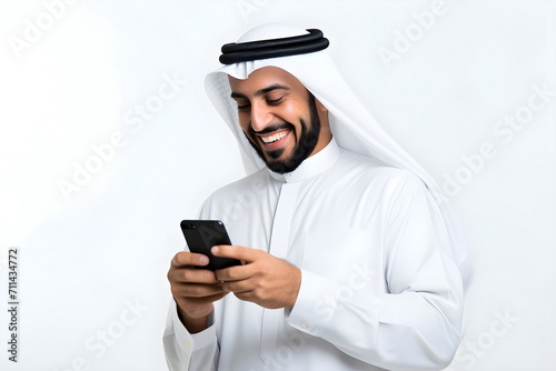 arabian man browsing on mobile phone isolated on white background © dobok