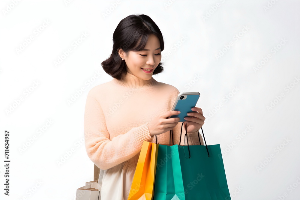 arabian woman with shopping bags using mobile phone isolated on white background arabian woman with shopping bags using mobile phone isolated on white background