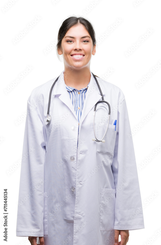 Young hispanic doctor woman with a happy face standing and smiling with a confident smile showing teeth