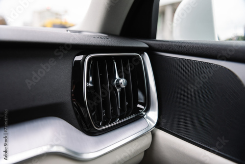 Deflector. car ventilation system. Car air conditioner closeup. Automotive climate control. Airflow inside the car. Interior element of a modern premium car. Detail interior. Air ducts. photo