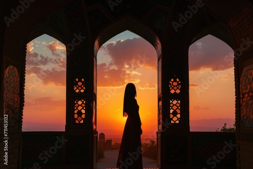 Persian woman in national dress against Iranian architecture photo