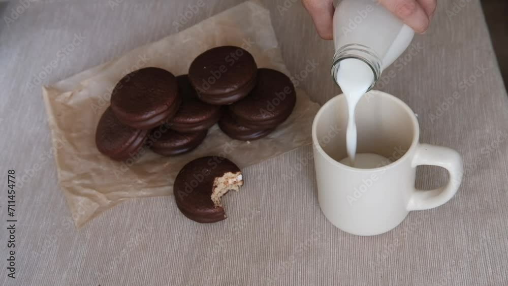 Choco Pie Chocolate Coated Snacks And Bottle Of Milk On Wooden Background