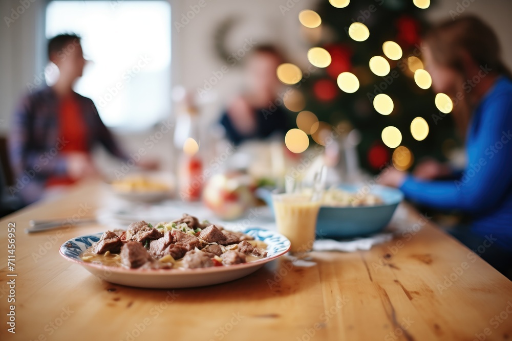 family dinner scene with beef stroganoff as the main dish on the table