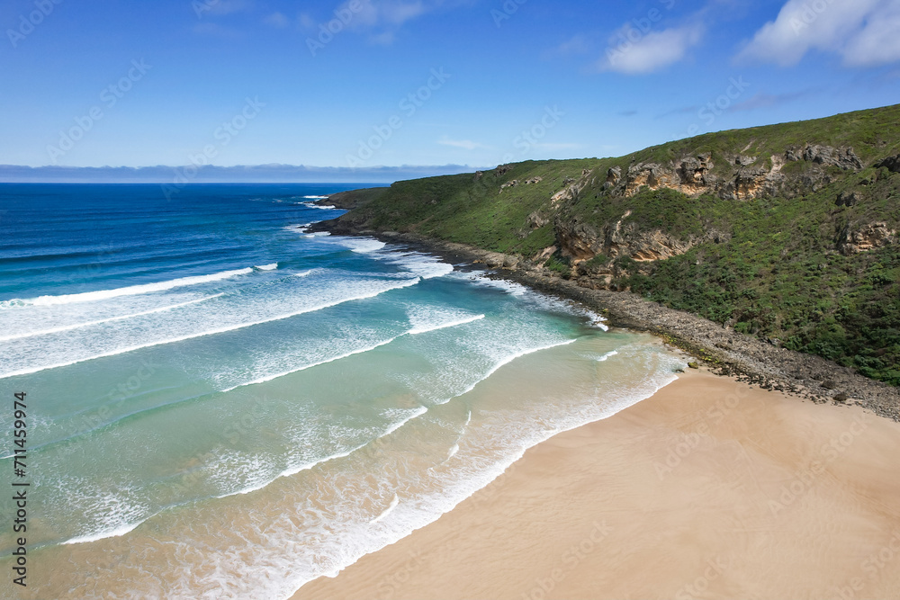Waves rolling in on a remote Western Australian beach along the south coast