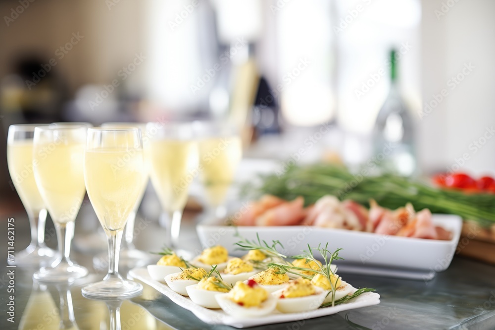 deviled eggs as part of a brunch spread with mimosas