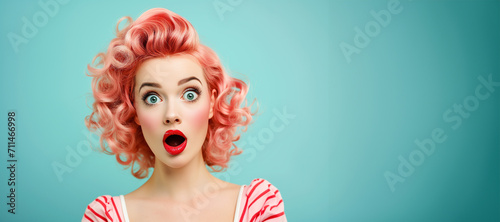 Woman with red lips surprise.Beautiful girl with curly hair surprised and shocked looks on you . Presenting your product. Portrait of impressed pretty person open mouth look camera news information  photo