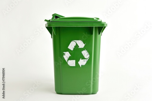 Green trash can with recycling symbol, concept of environmental preservation and Earth Day.