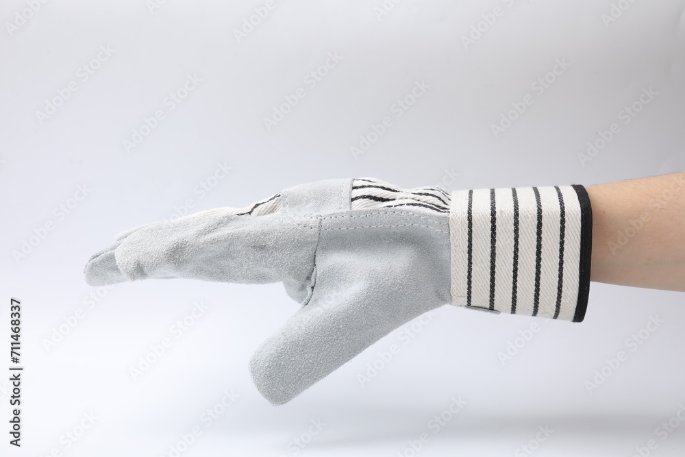 Woman in gardening glove on white background, closeup Woman in gardening glove on white background, closeup