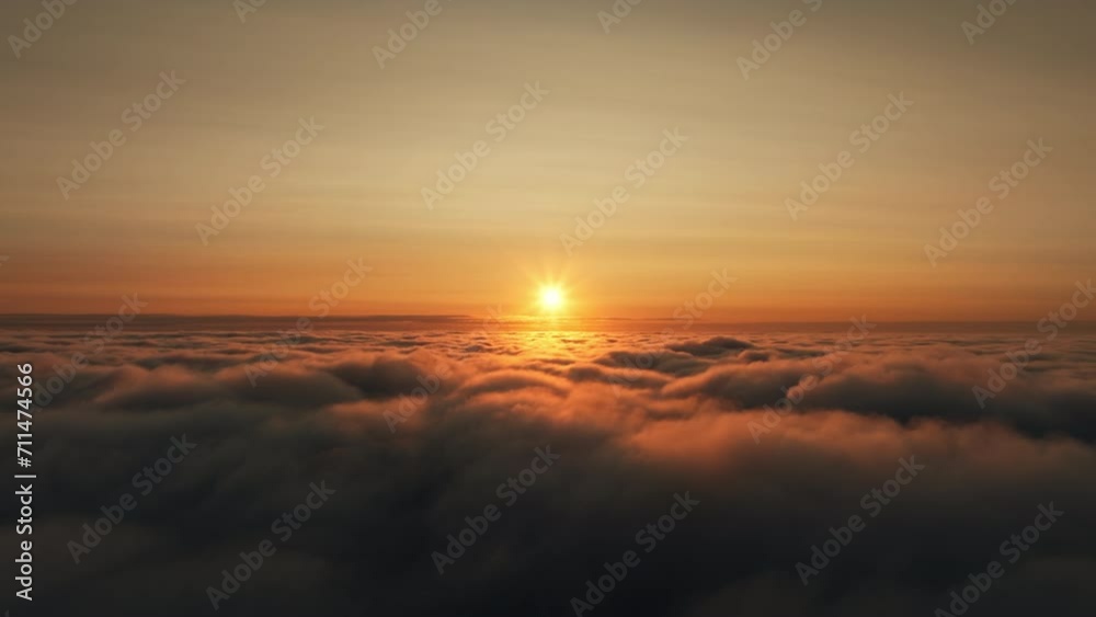 Flying up and above scenic clouds at sunset, dreamy aerial view Flying up and above scenic clouds at sunset, dreamy aerial view
