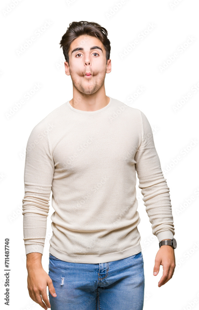 Young handsome man over isolated background making fish face with lips, crazy and comical gesture. Funny expression. Young handsome man over isolated background making fish face with lips, crazy and comical gesture. Funny expression.