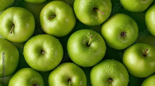 Foto Fresh green Granny Smith apples fruit background image.