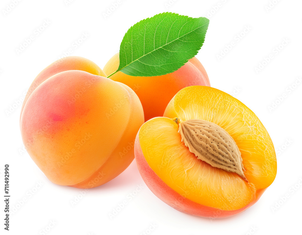 Sliced apricots with seed and leaf isolated on white Sliced apricots with seed and leaf isolated on white