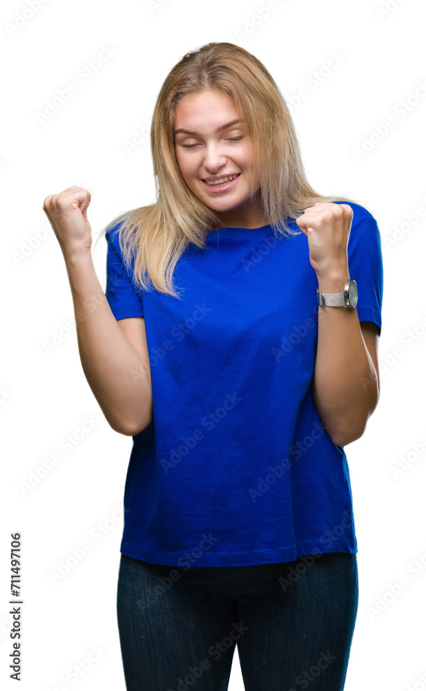 Young caucasian woman over isolated background very happy and excited doing winner gesture with arms raised, smiling and screaming for success. Celebration concept. Young caucasian woman over isolated background very happy and excited doing winner gesture with arms raised, smiling and screaming for success. Celebration concept.