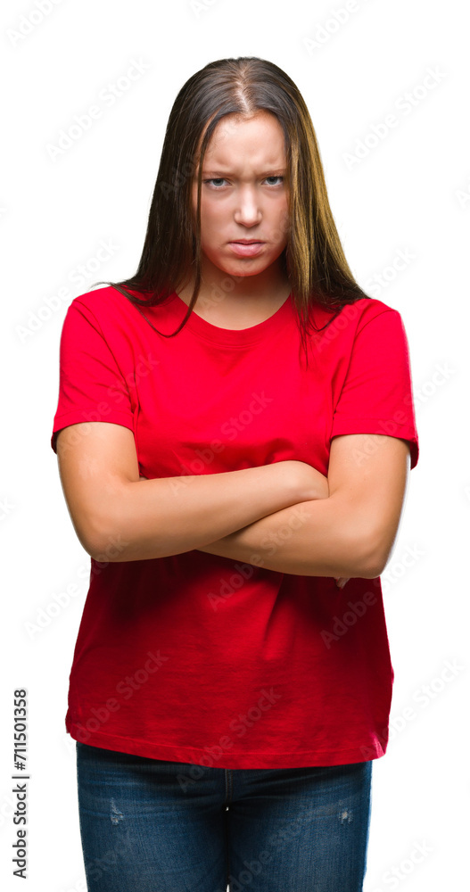 Young beautiful caucasian woman over isolated background skeptic and nervous, disapproving expression on face with crossed arms. Negative person. Young beautiful caucasian woman over isolated background skeptic and nervous, disapproving expression on face with crossed arms. Negative person.