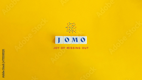 JOMO, or Joy of Missing Out Phrase and Concept Image.  photo