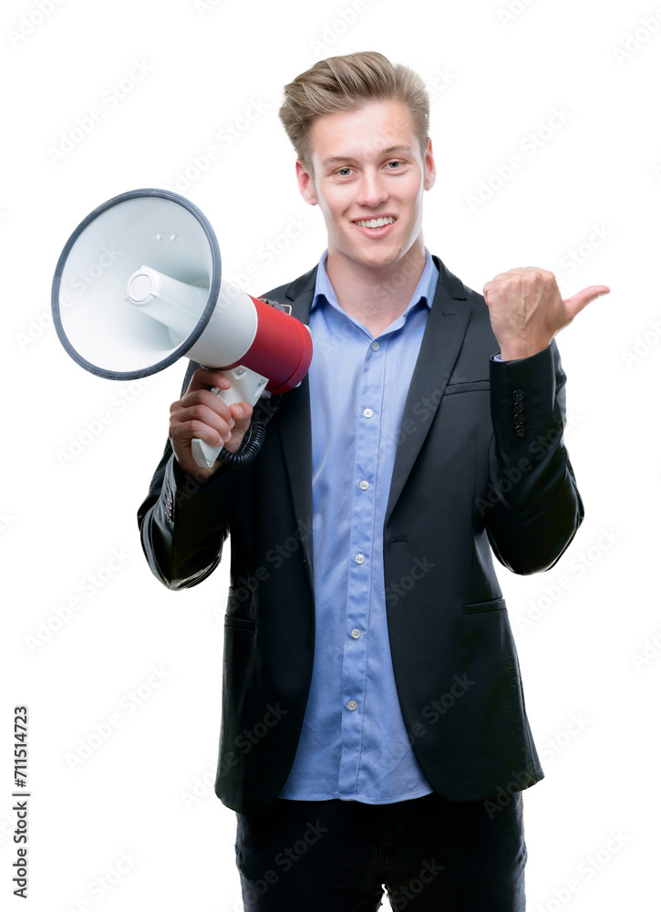 Young handsome blond man holding a megaphone pointing with hand and finger up with happy face smiling Young handsome blond man holding a megaphone pointing with hand and finger up with happy face smiling