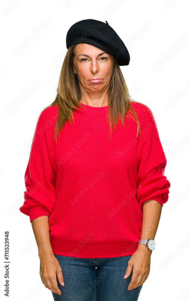 Middle age adult woman wearing fashion beret over isolated background depressed and worry for distress, crying angry and afraid. Sad expression. Middle age adult woman wearing fashion beret over isolated background depressed and worry for distress, crying angry and afraid. Sad expression.