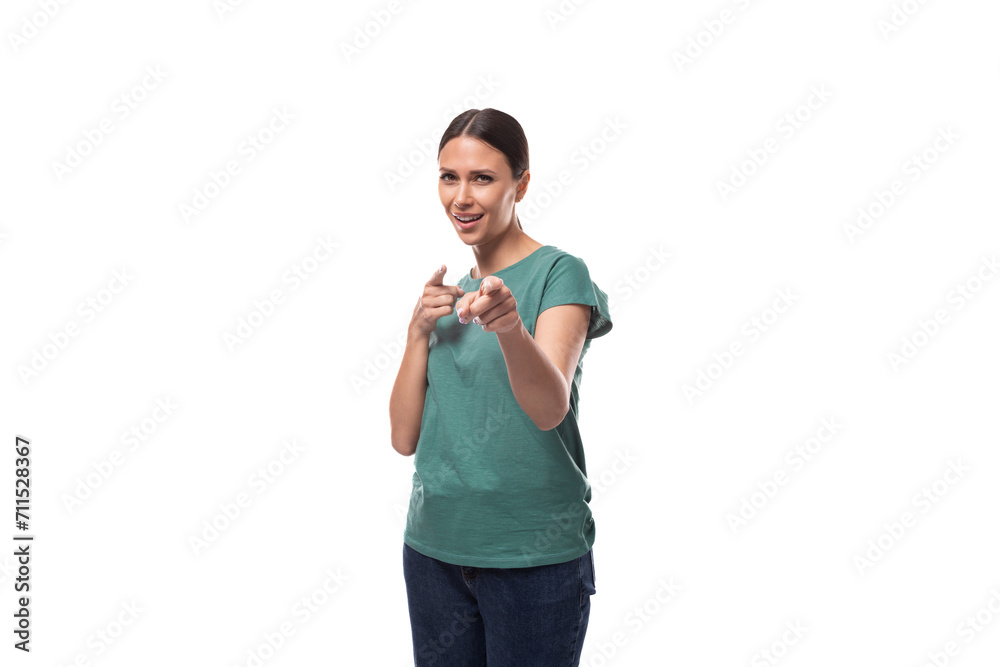 young slim woman dressed in a green basic t-shirt with branding print space young slim woman dressed in a green basic t-shirt with branding print space