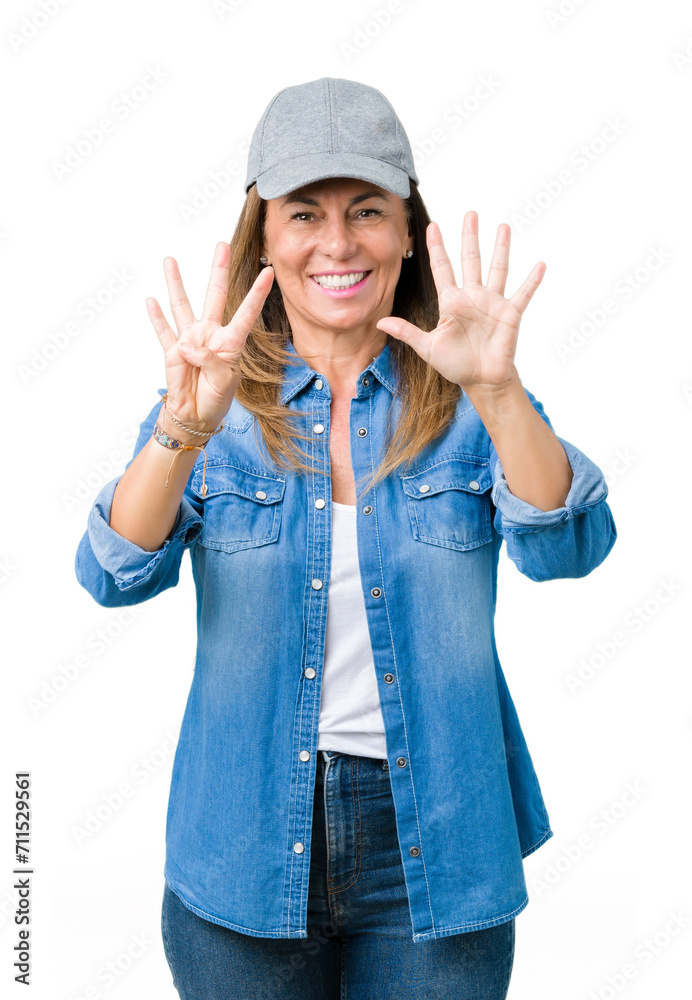 Beautiful middle age woman wearing sport cap over isolated background showing and pointing up with fingers number nine while smiling confident and happy. Beautiful middle age woman wearing sport cap over isolated background showing and pointing up with fingers number nine while smiling confident and happy.
