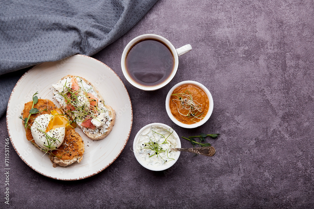 Healthy food - Low-Carb Cuisine sandwiches with zucchini spread and yogurt, egg, salmon, coffee cup. Low in calories, FODMAP, KETO diet, superfood. Copy space Healthy food - Low-Carb Cuisine sandwiches with zucchini spread and yogurt, egg, salmon, coffee cup. Low in calories, FODMAP, KETO diet, superfood. Copy space