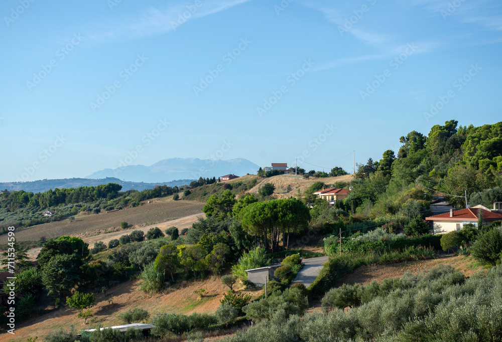 Beautiful view, hills, blue sky, Italian landscape, mountains, travel in Europe, vacation, tourism.