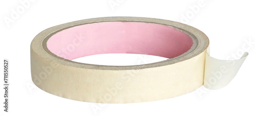 Roll of cream colored paper sticky tape. Masking tape