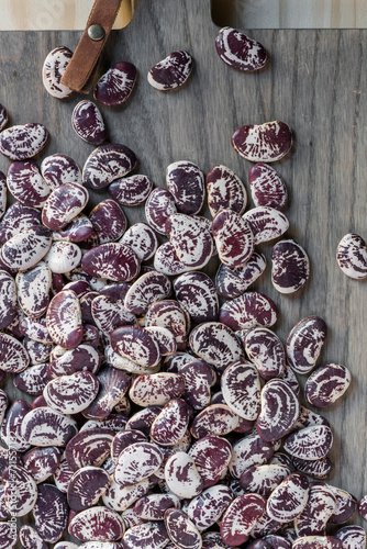 Heirloom beans on kitchen cutting board