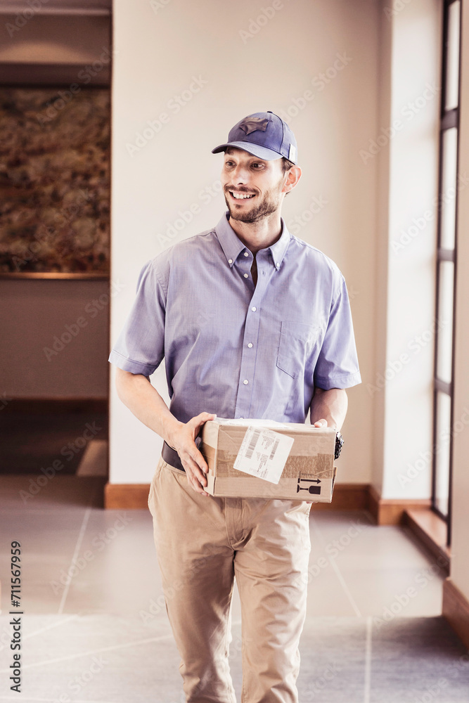 Package delivery person picking up package at large office building. Package delivery person picking up package at large office building.