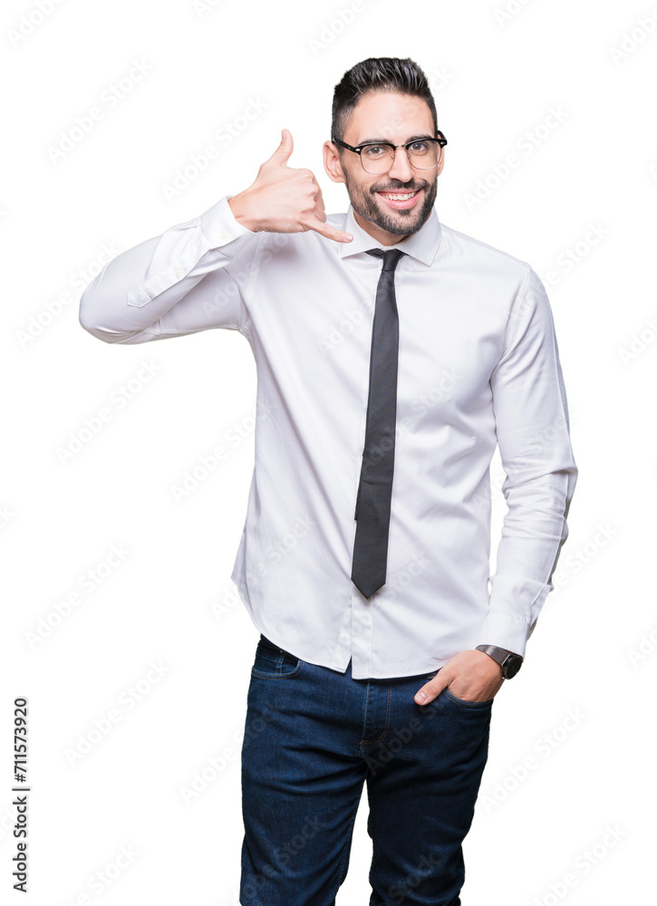 Young handsome business man wearing glasses over isolated background smiling doing phone gesture with hand and fingers like talking on the telephone. Communicating concepts. Young handsome business man wearing glasses over isolated background smiling doing phone gesture with hand and fingers like talking on the telephone. Communicating concepts.