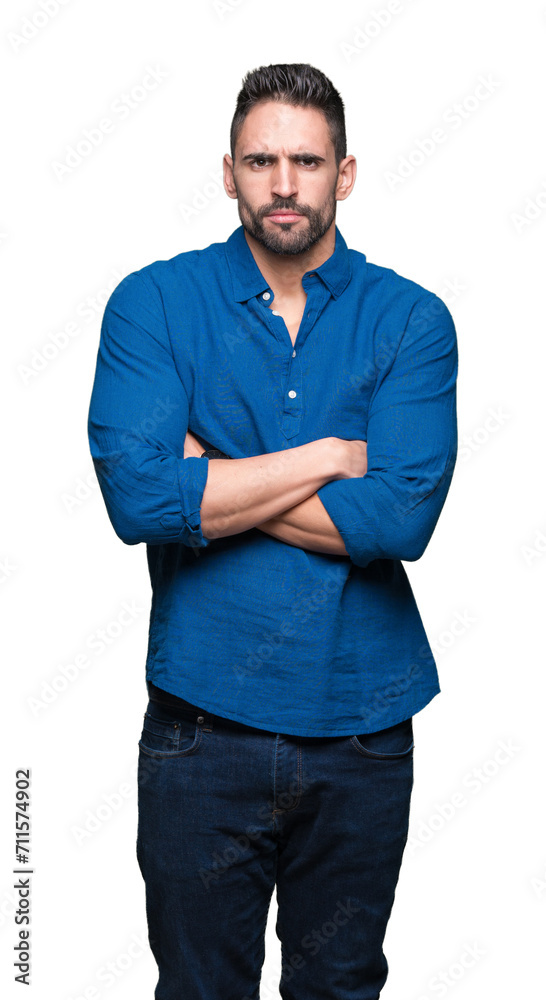 Young handsome man over isolated background skeptic and nervous, disapproving expression on face with crossed arms. Negative person. Young handsome man over isolated background skeptic and nervous, disapproving expression on face with crossed arms. Negative person.