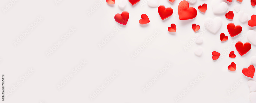 Valentine's Day. Pink and white hearts, flat lay, background with empty space in the center. Love concept. Many decorative hearts on a white background. For postcards