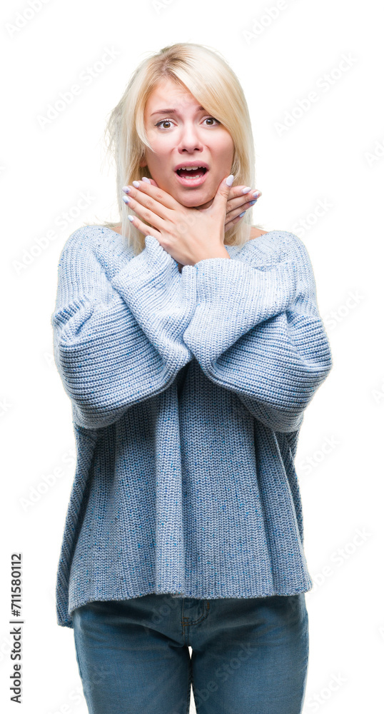 Young beautiful blonde woman wearing winter sweater over isolated background shouting and suffocate because painful strangle. Health problem. Asphyxiate and suicide concept. Young beautiful blonde woman wearing winter sweater over isolated background shouting and suffocate because painful strangle. Health problem. Asphyxiate and suicide concept.