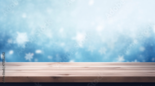 Empty wooden table on blurred background with falling snow. A place to place your product. Background. Winter