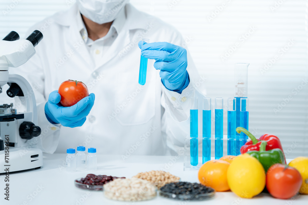 Scientist check chemical food residues in laboratory. Control experts inspect quality of fruits, vegetables. lab, hazards, ROHs, find prohibited substances, contaminate, Microscope, Microbiologist Scientist check chemical food residues in laboratory. Control experts inspect quality of fruits, vegetables. lab, hazards, ROHs, find prohibited substances, contaminate, Microscope, Microbiologist