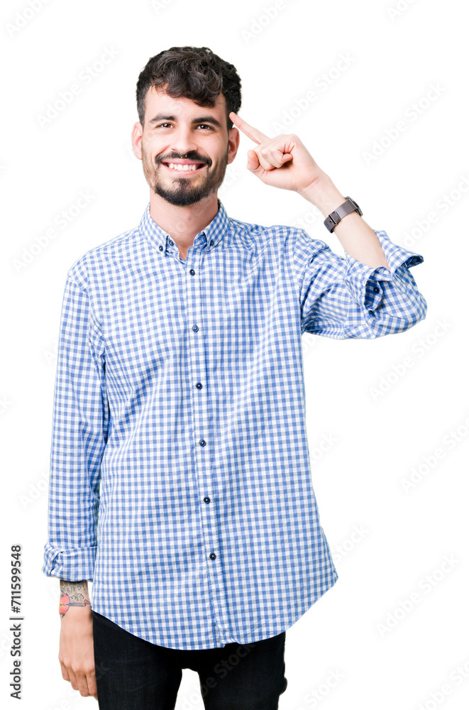 Young handsome business man over isolated background Smiling pointing to head with one finger, great idea or thought, good memory Young handsome business man over isolated background Smiling pointing to head with one finger, great idea or thought, good memory