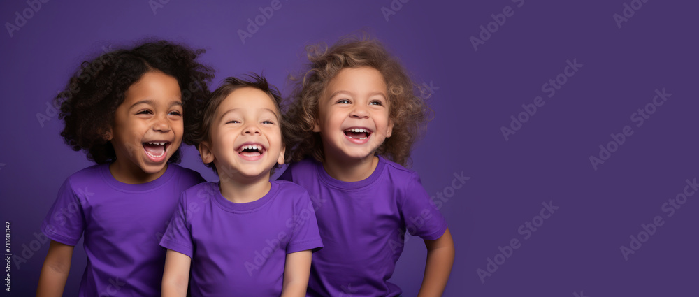 Portrait of three laughing Toddler children of different races on bright purple background. Multicultural group of little happy children, cheerful childhood, kindergarten concept, friends Portrait of three laughing Toddler children of different races on bright purple background. Multicultural group of little happy children, cheerful childhood, kindergarten concept, friends