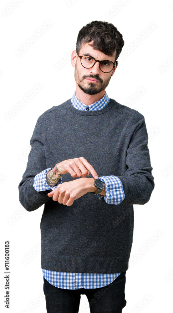 Young handsome smart man wearing glasses over isolated background In hurry pointing to watch time, impatience, upset and angry for deadline delay Young handsome smart man wearing glasses over isolated background In hurry pointing to watch time, impatience, upset and angry for deadline delay