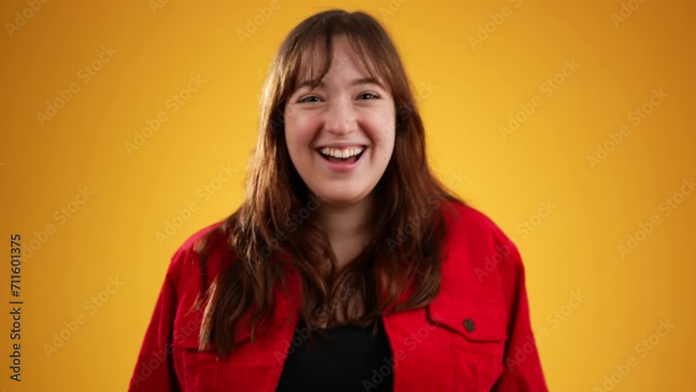 Portrait of caucasian woman 20s puts hand to ear to listen to secret isolated on yellow background studio with copy space Portrait of caucasian woman 20s puts hand to ear to listen to secret isolated on yellow background studio with copy space