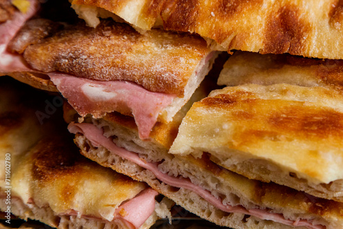 Pizza and mortadella a typical street food in rome 