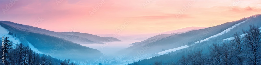 Dramatic overlook of a misty valley at twilight