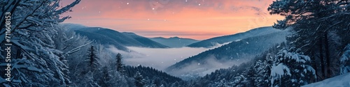 Dramatic overlook of a snowy valley at twilight