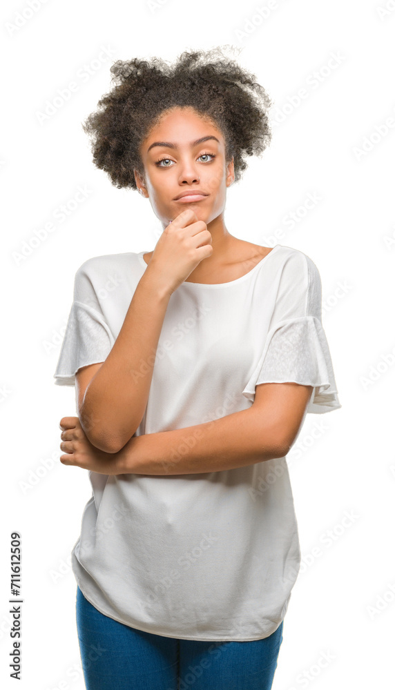 Young afro american woman over isolated background looking confident at the camera with smile with crossed arms and hand raised on chin. Thinking positive. Young afro american woman over isolated background looking confident at the camera with smile with crossed arms and hand raised on chin. Thinking positive.