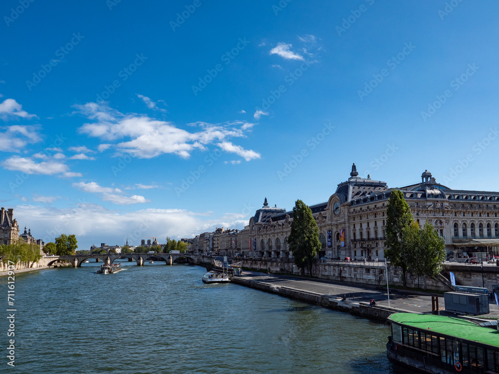 View of the Seine in Paris. A bridge in the background