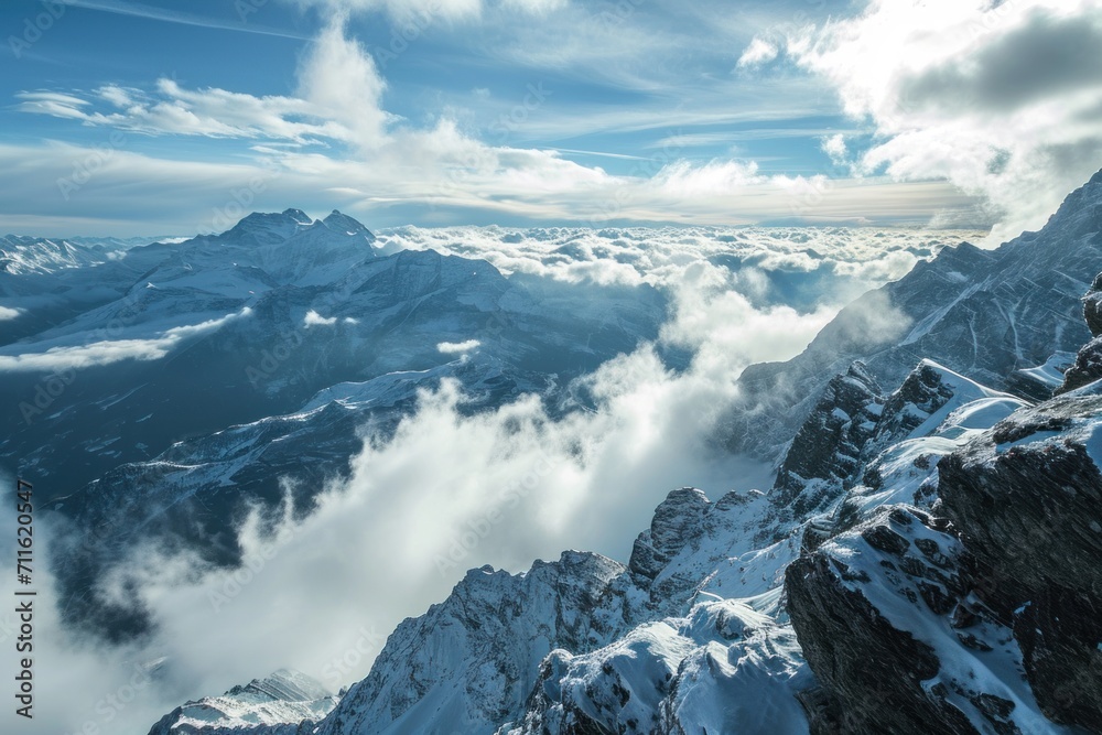 Obraz premium A cloudy view of the Swiss Alpine range in Titlis, Switzerland.