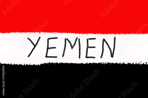 The flag of Yemen painted with a brush in a graphics program.
