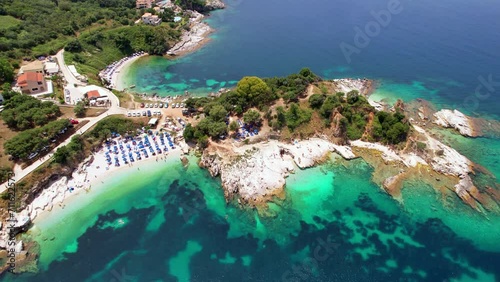 Greece summer holidays . Best beaches and scenic village  of Corfu island .aerial drone view of Kassiopi north-eastern part photo