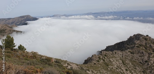 Hiking above the clouds and fog