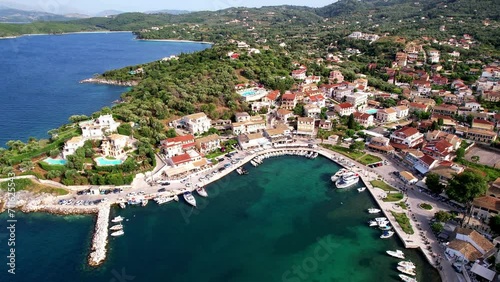 Greece summer holidays . Best beaches and scenic village  of Corfu island .aerial drone view of Kassiopi north-eastern part photo