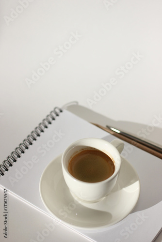 Business Workspace with Notebook  Stationery and Cup of Coffee. Business Mockup Design. Coffee Break at Work.