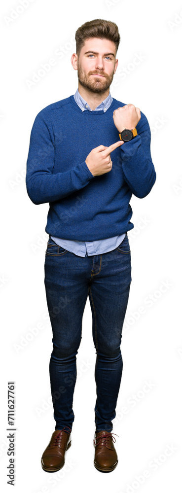Young handsome bussines man In hurry pointing to watch time, impatience, upset and angry for deadline delay Young handsome bussines man In hurry pointing to watch time, impatience, upset and angry for deadline delay